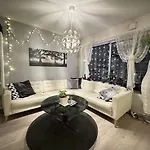 And Cozy Next To S