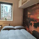 And Cozy Next To S
