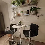 And Cozy Next To S